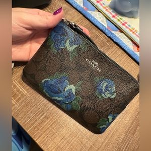 Coach wristlet signature print with blue roses